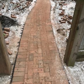 Brick walkway through yard